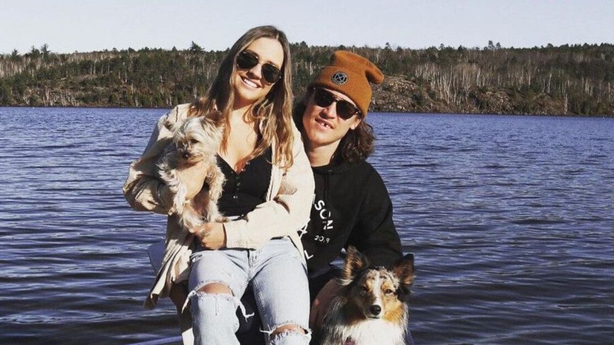 Tyler Bertuzzi with his wife Ashley and their two dogs.
