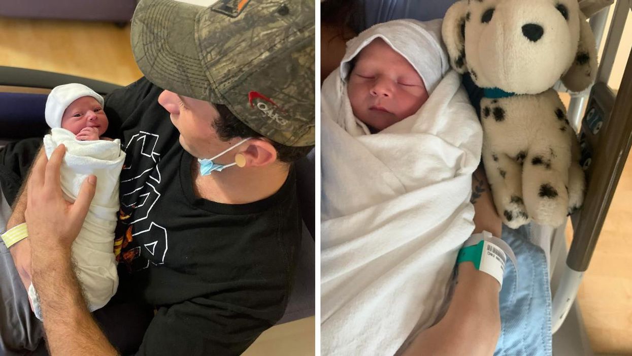 Tyler Remillard and his new born baby Casen Ryley.