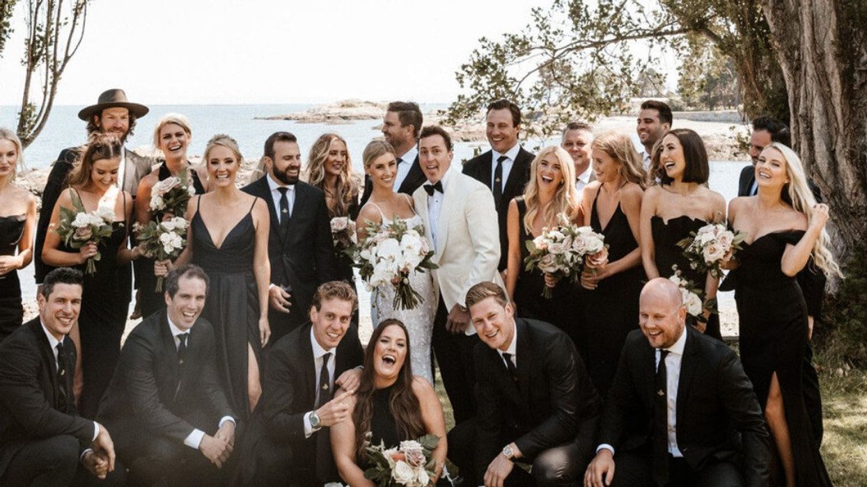 Tyson Barrie and Emma Rose with their wedding party in Victoria, BC.