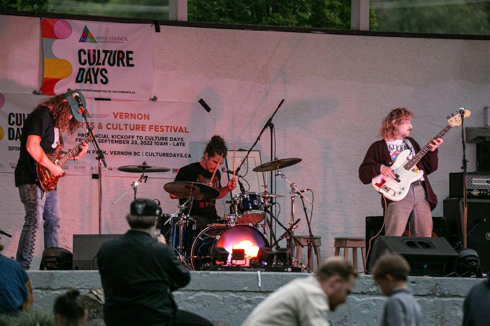 \u200bA band performs on stage at the Sundog Festival of Arts and Culture.