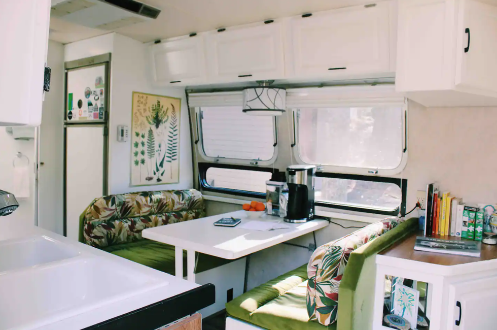 \u200bA botanical themed dining area in The Shiny Home Airbnb.