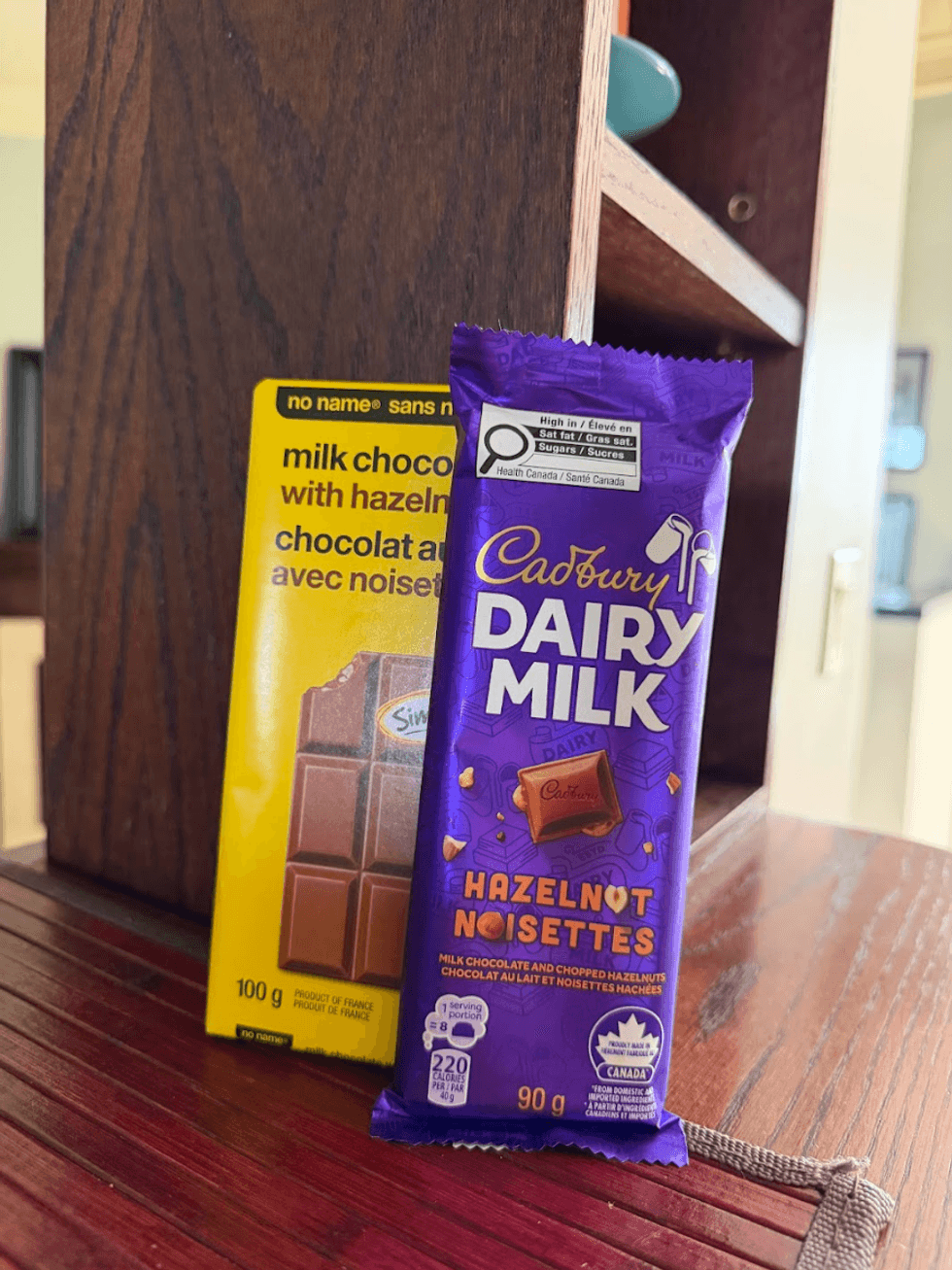 u200bCadbury Dairy Milk bar compared to No Name chocolate bar.