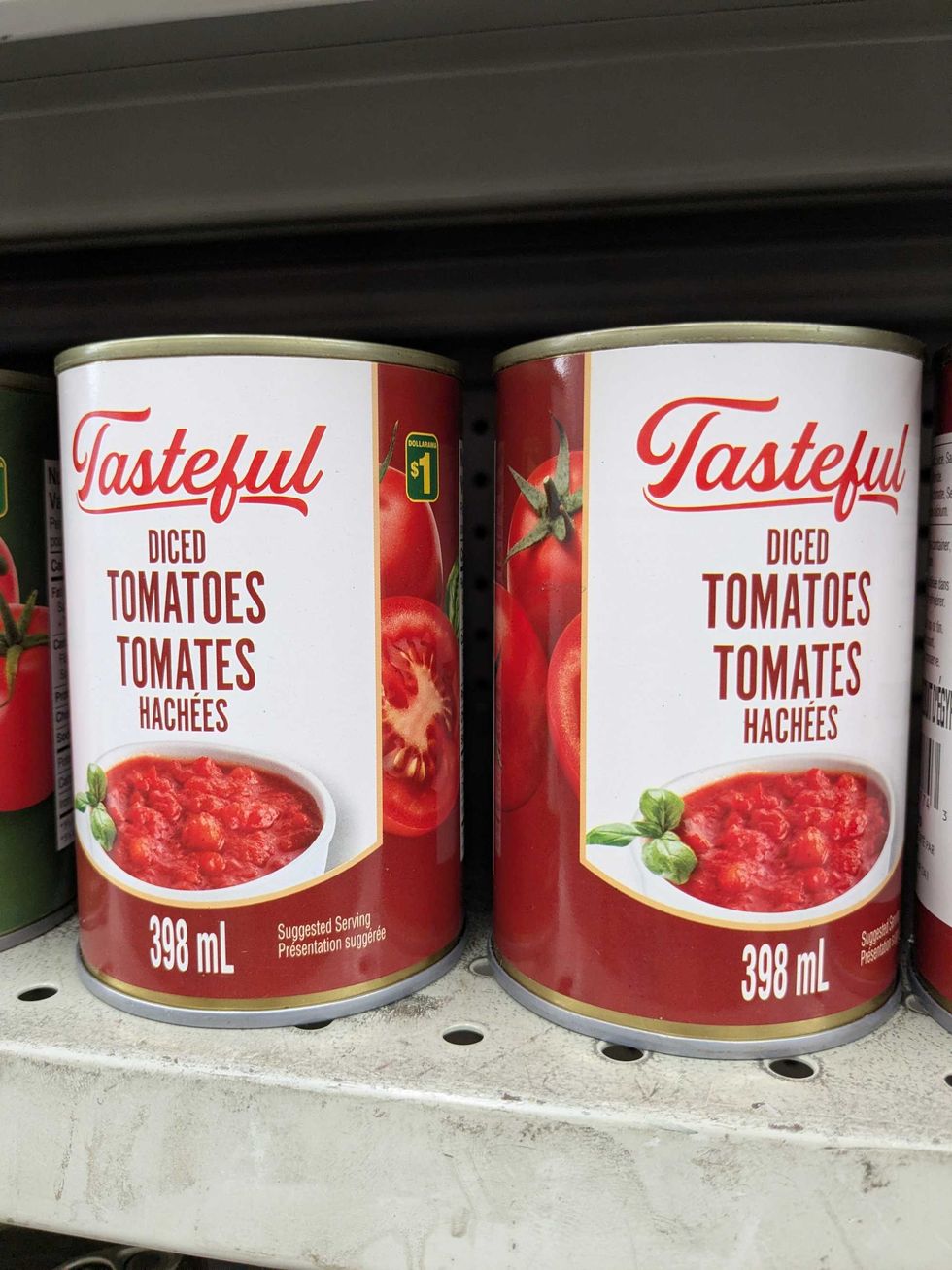 \u200bCans of diced tomatoes on a shelf