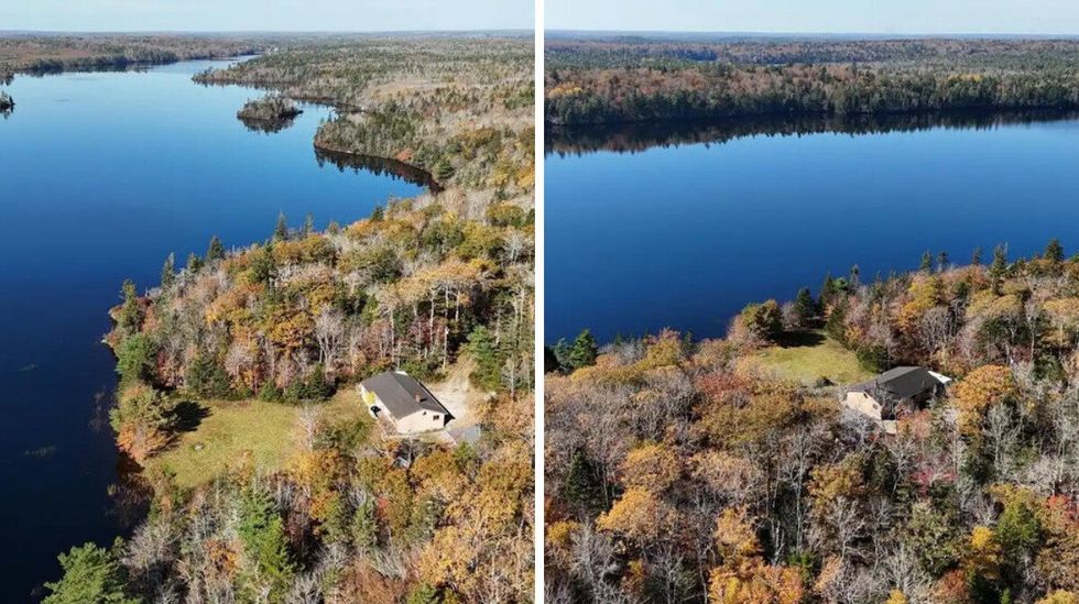 \u200bHouse for sale in Nova Scotia on a lake and surrounded by a forest.