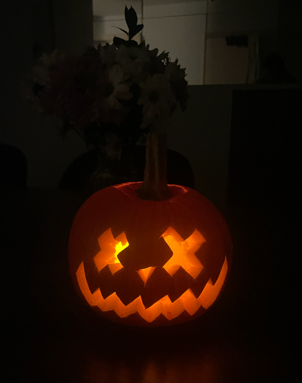 \u200bLit up pumpkin.