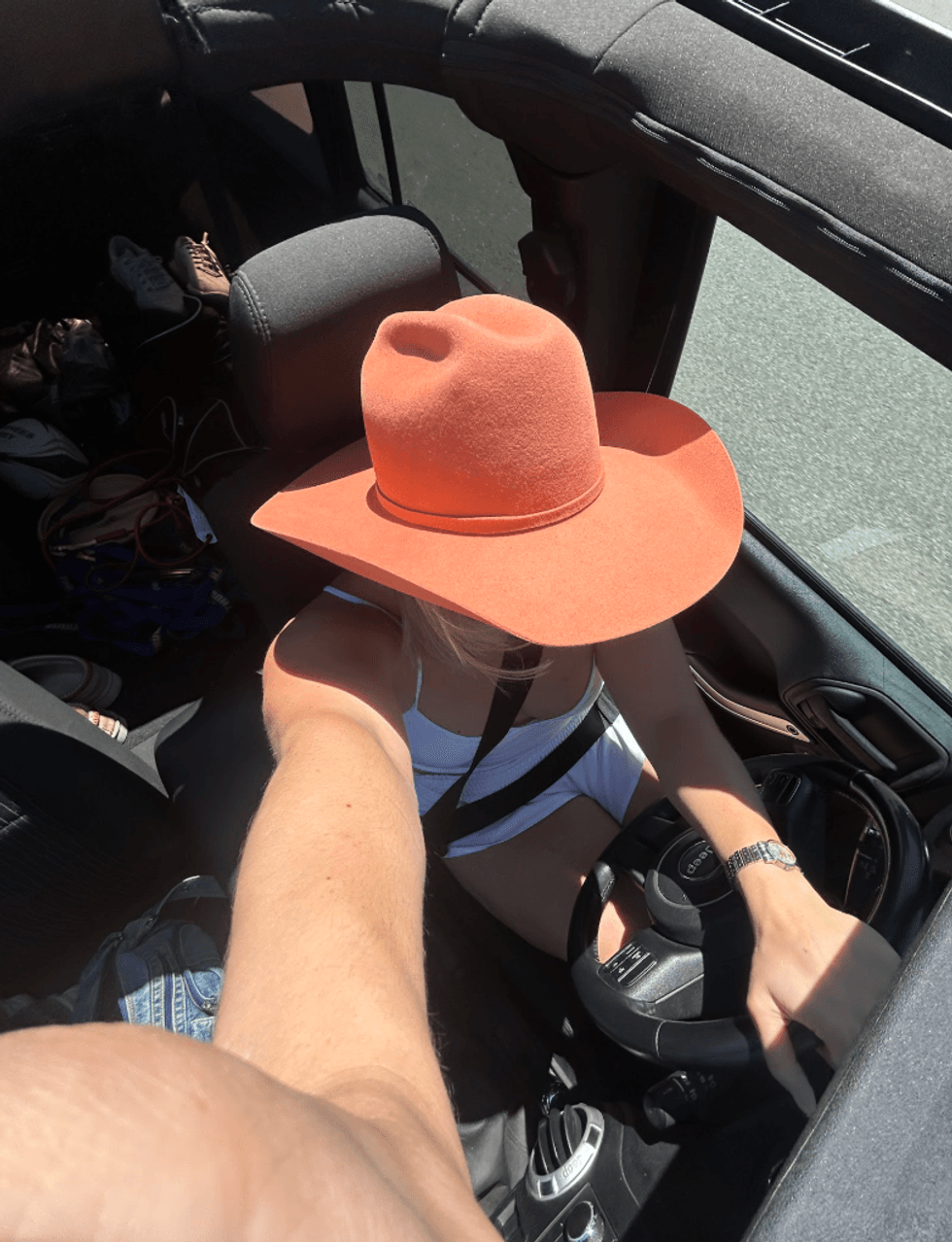 \u200bPerson in a car.