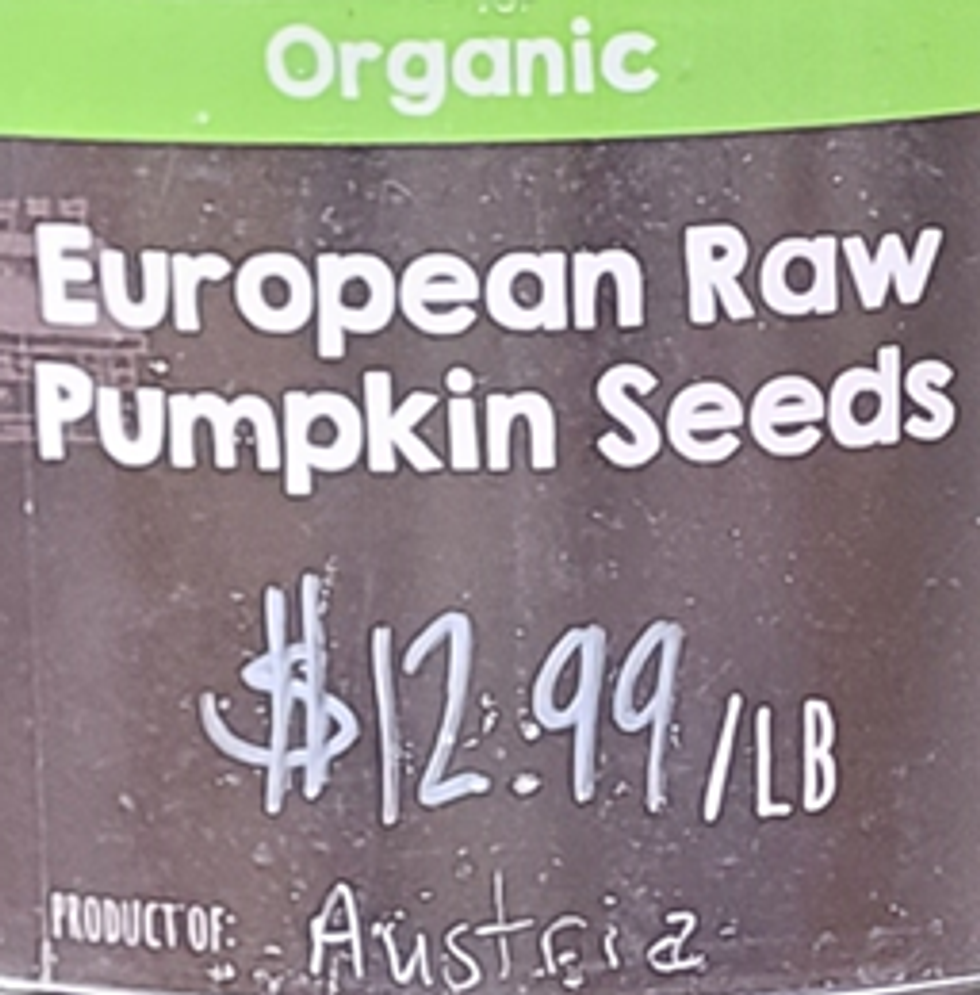 \u200bSign for bulk bin of Organic European Raw Pumpkin Seeds.