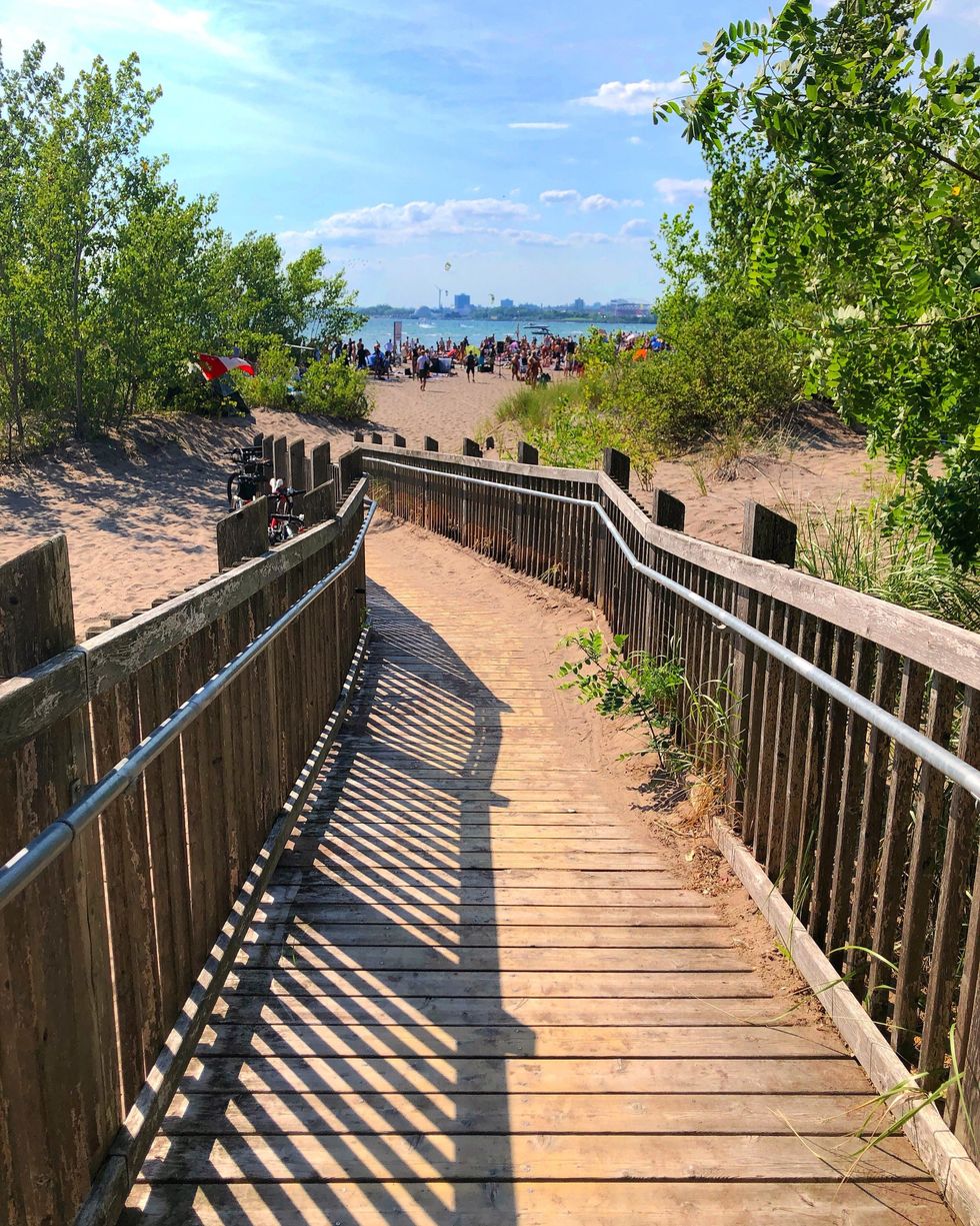 \u200bThe boardwalk to Hanlan's Point Beach.