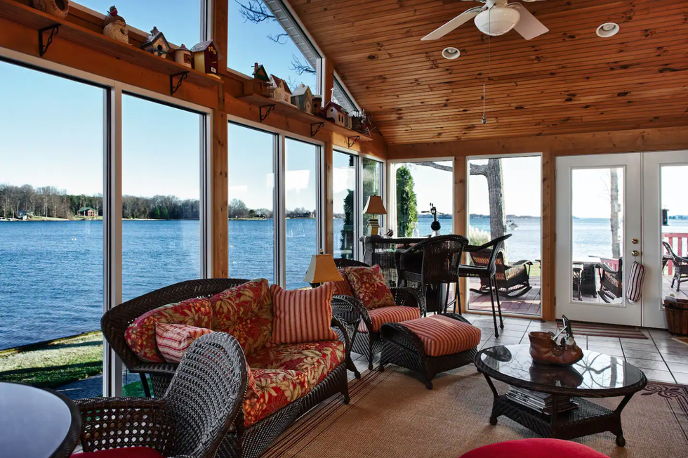 \u200bThe living room area overlooking the lake.