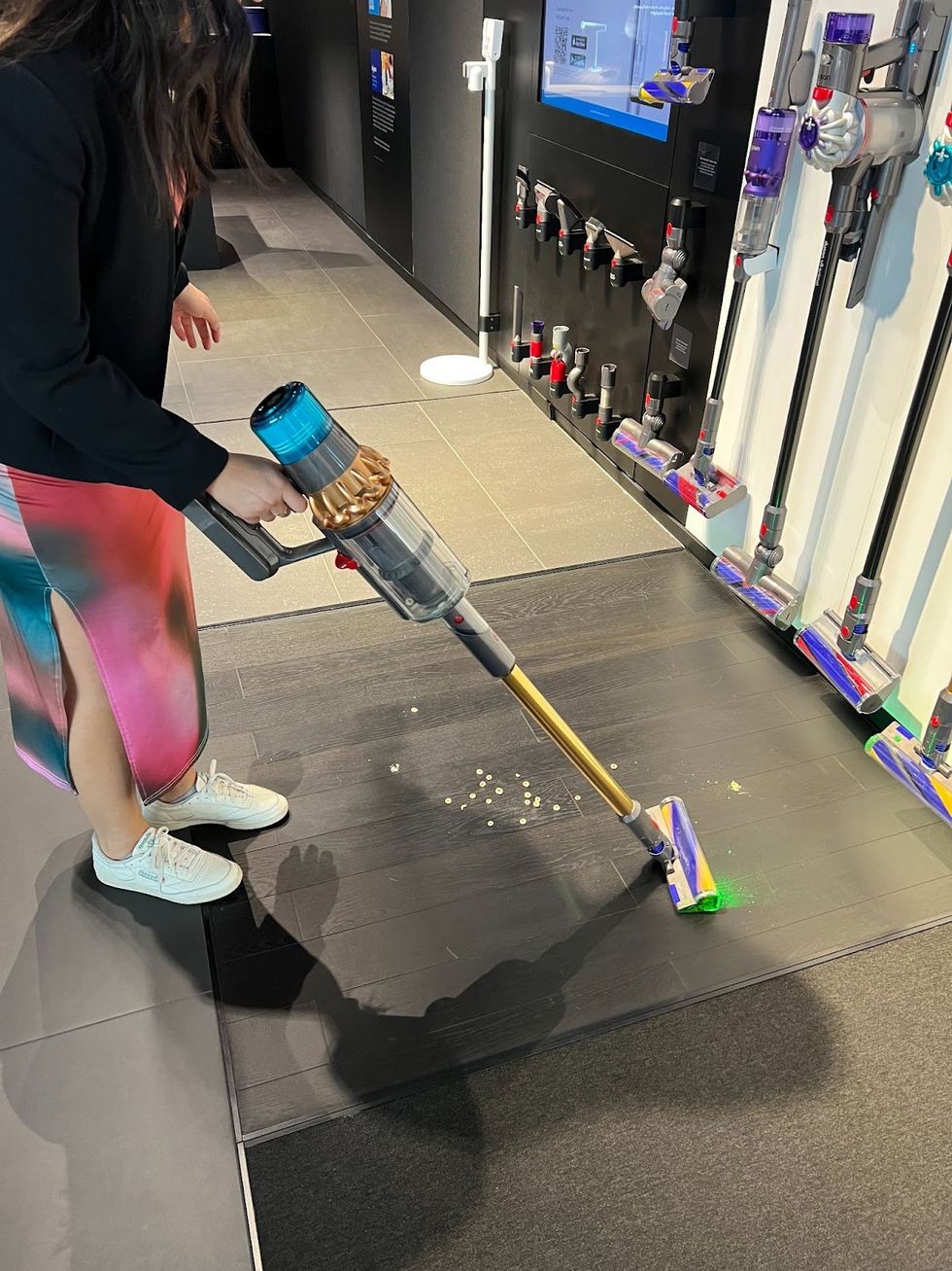 \u200bVacuuming up cereal with the Dyson V15 Detect Absolute.