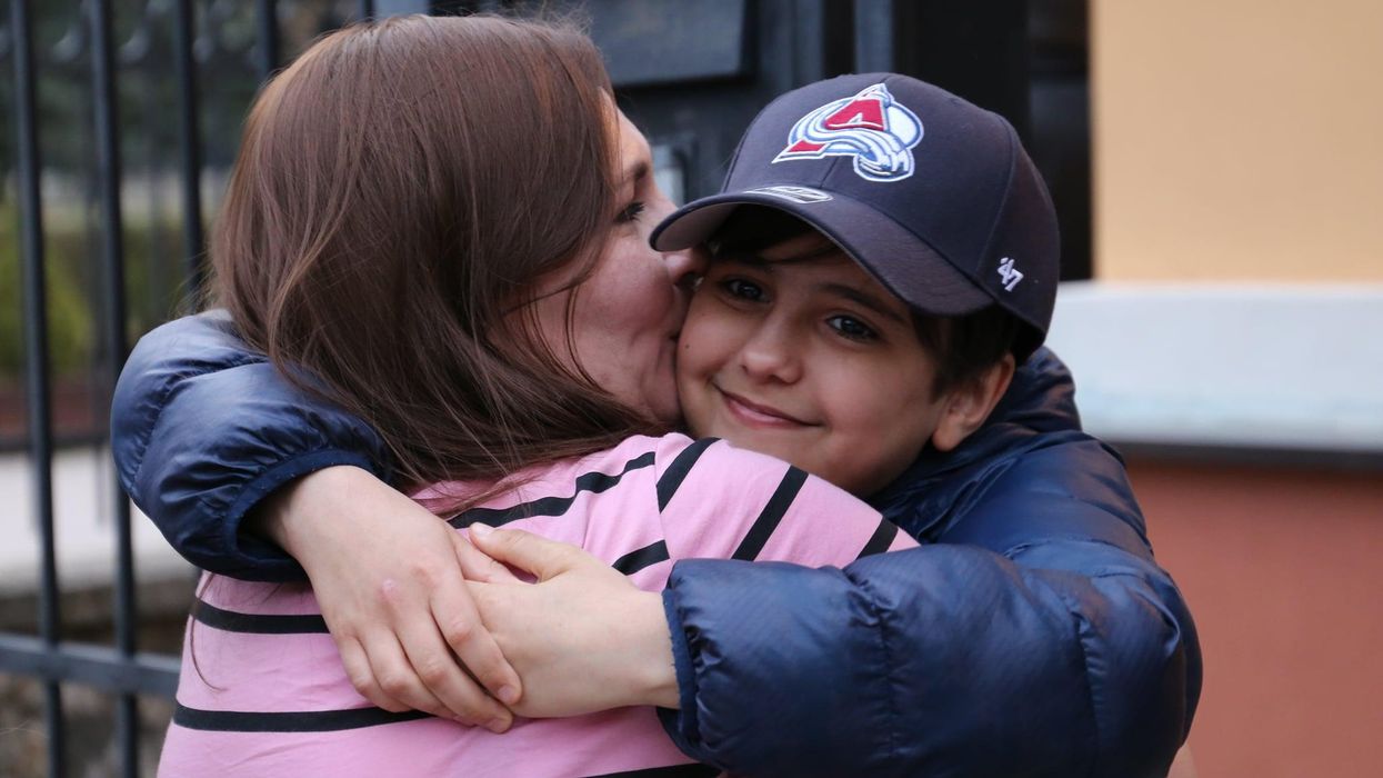 Ukrainian boy reunited with his mom.