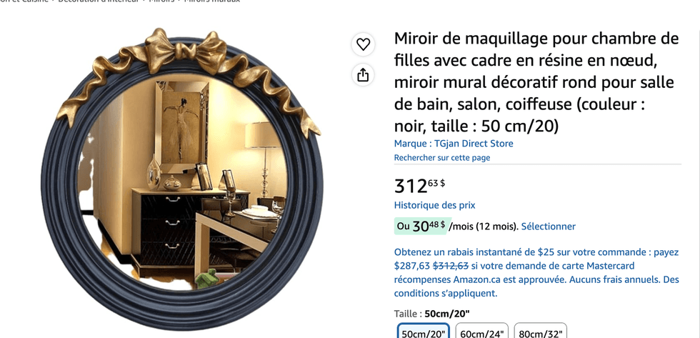 Un miroir rond noir avec une boucle dor\u00e9e sur le site d'Amazon Canada.