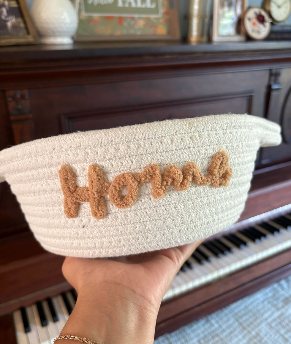 Un panier avec le mot \u00ab Home \u00bb.