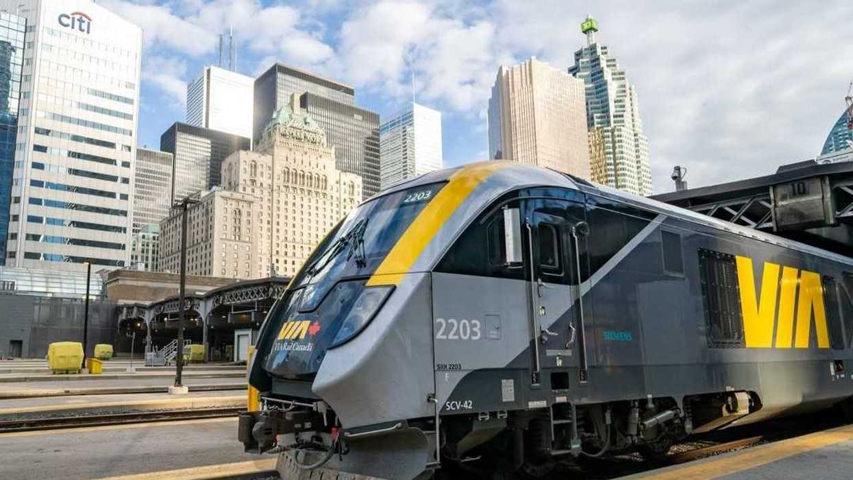 via rail train on tracks in toronto