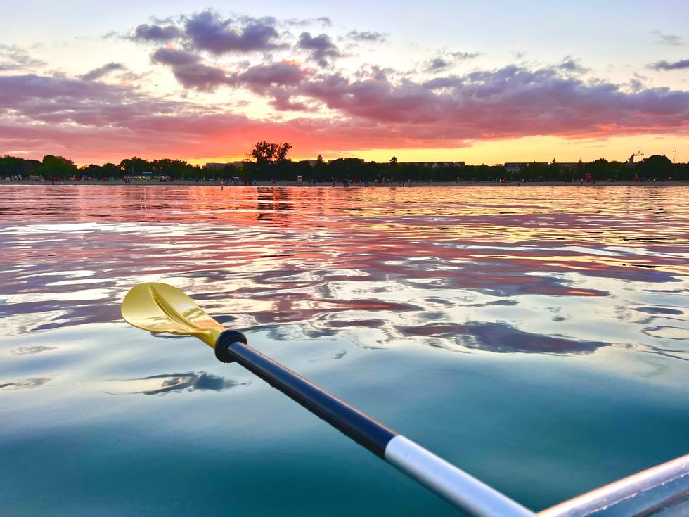 View of sunset over Woodbine Beach from a kayak.