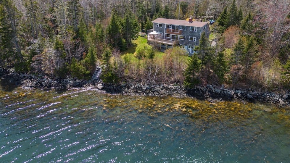 View of the house for sale from the ocean.