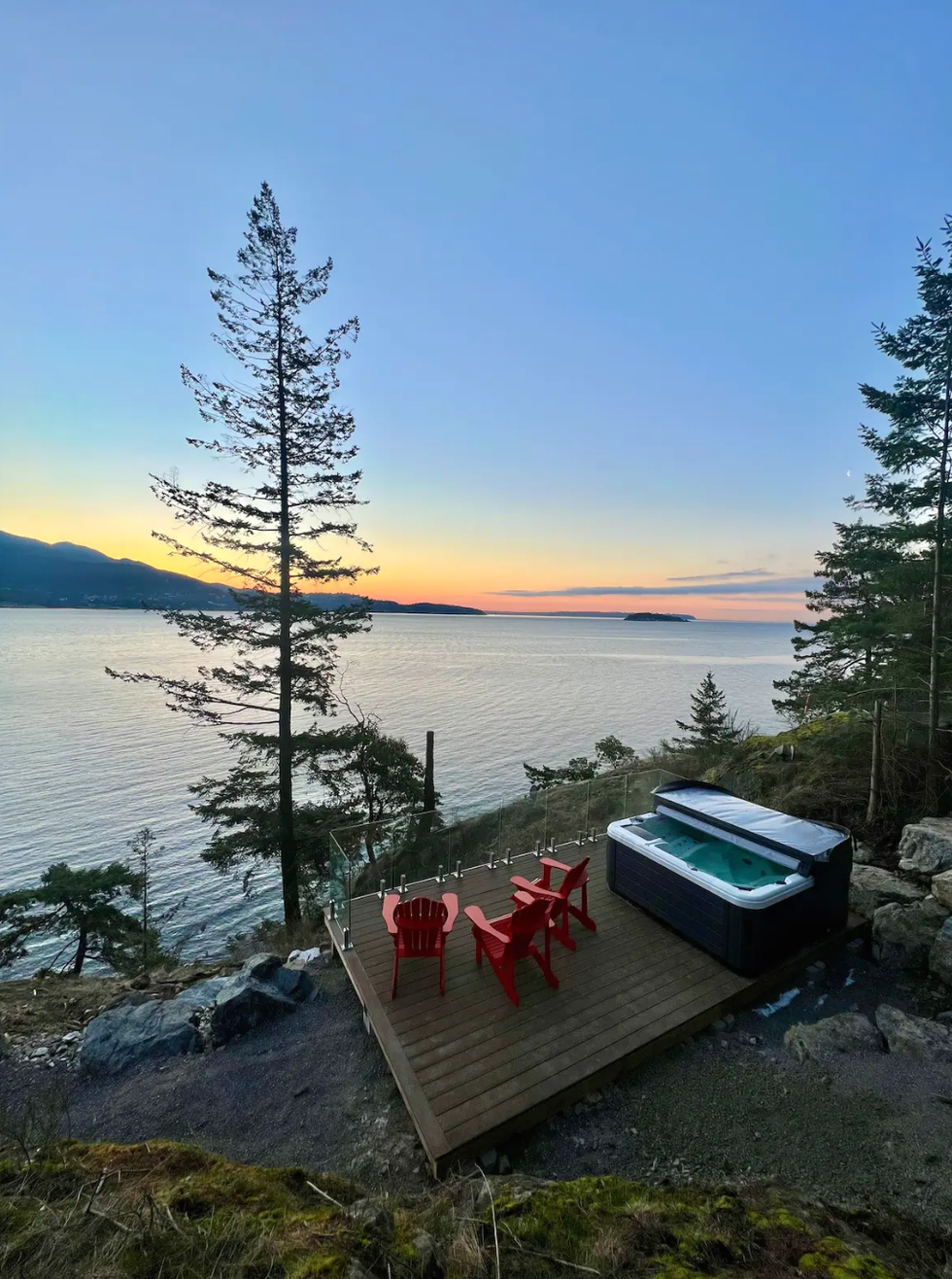View of the ocean and hot tube from Airbnb.