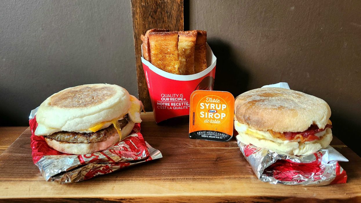Wendy's English Muffin Sandwich with sausage and bacon and Wendy's Homestyle French Toast Sticks.