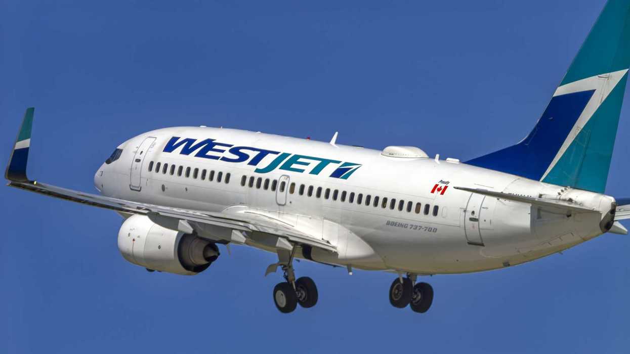 westjet airplane in the sky during take off
