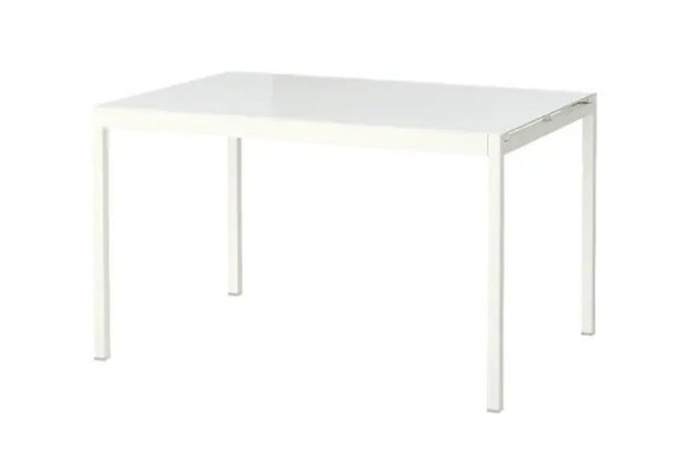 White extendable dining table.