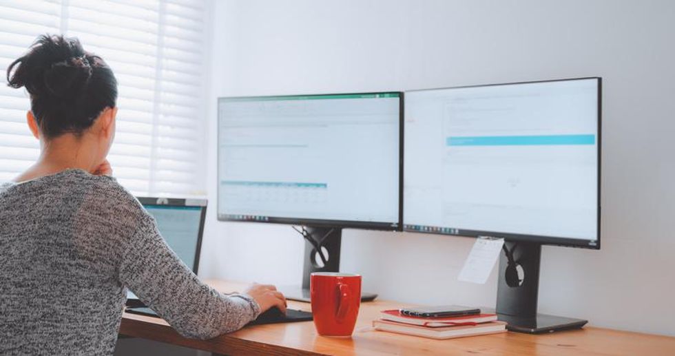 Woman working remotely on the computer.
