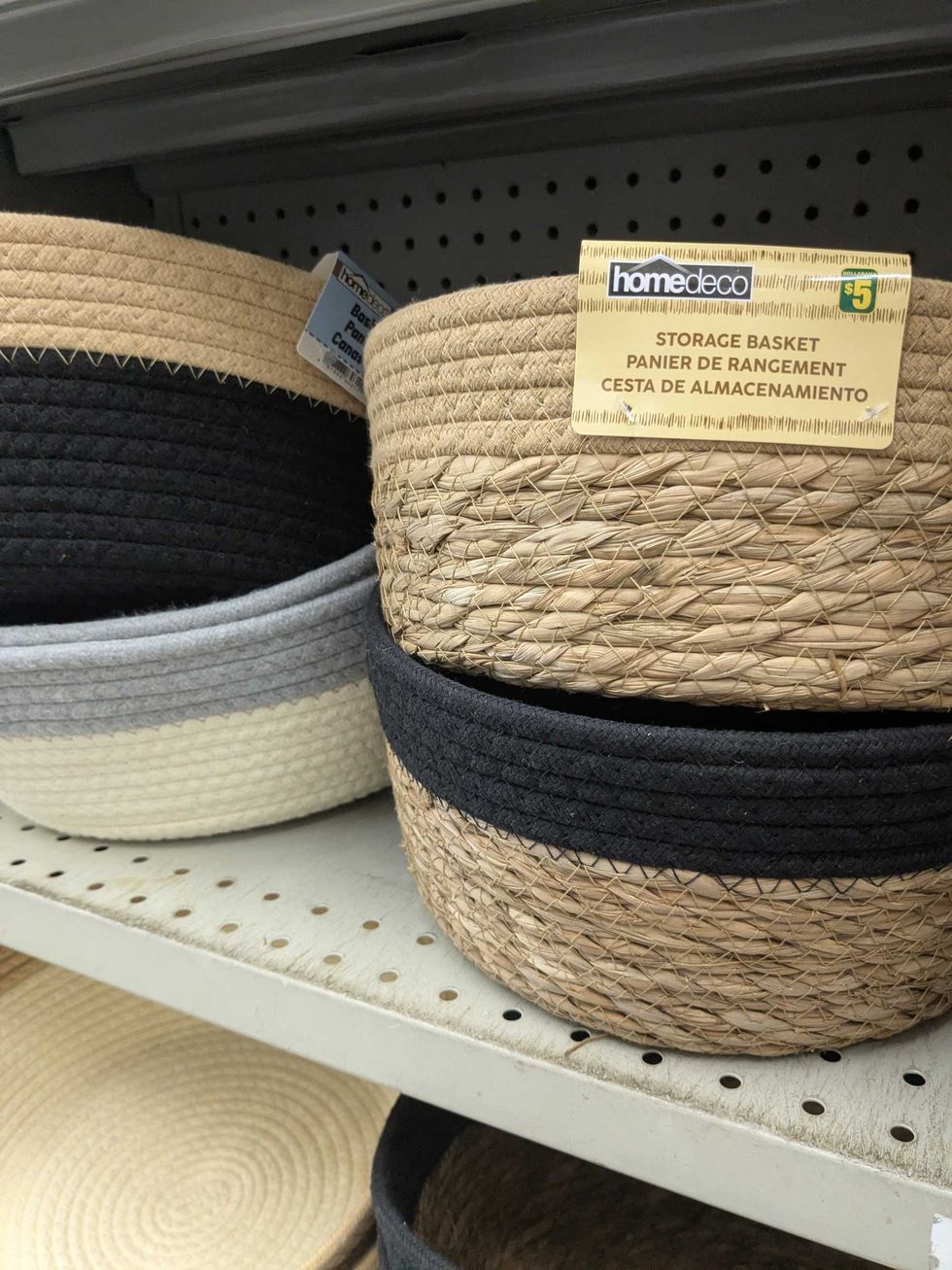 Woven baskets on a shelf at Dollarama