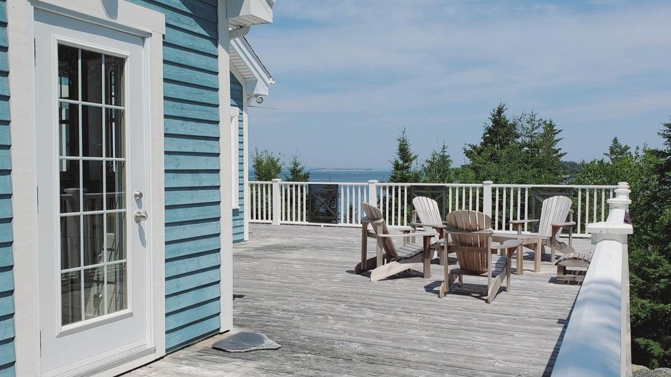 Wraparound deck of the house that overlooks the ocean.