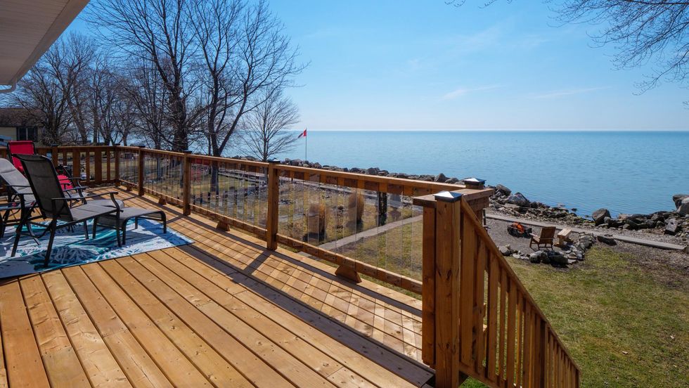 Wraparound deck with a view of the lake.