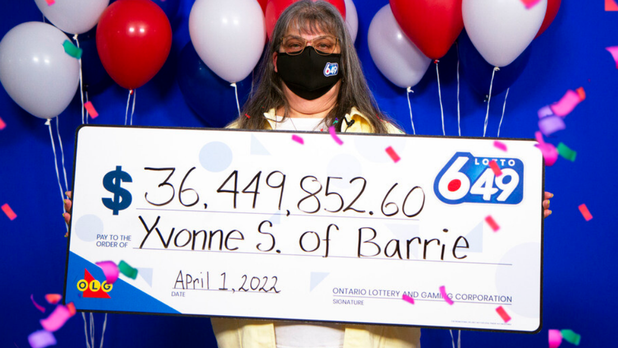 Yvonne Sauve with her Lotto 6/49 cheque.